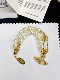 Thumbnail for Vivienne Westwood Safety Pin Pearl Bracelet