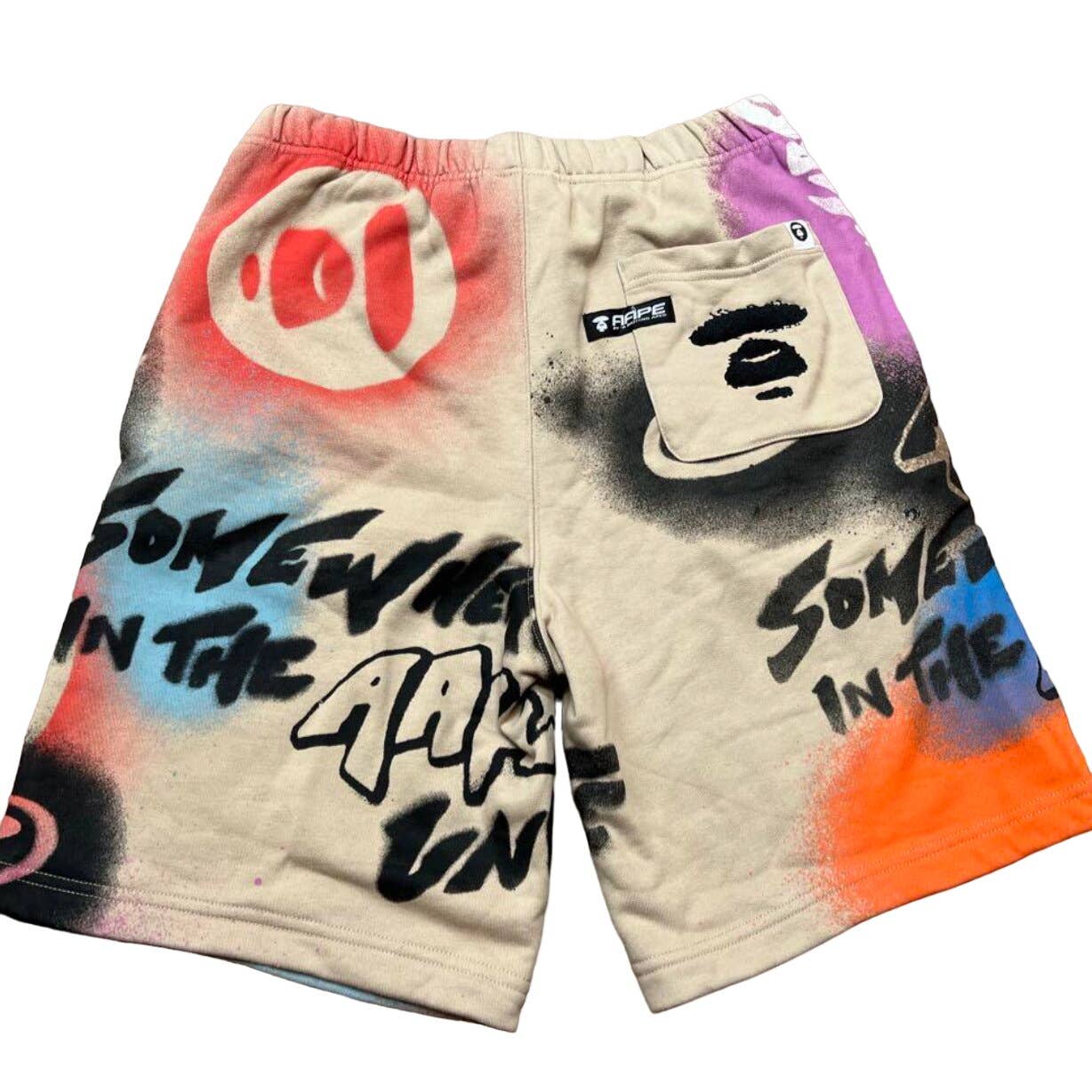 AAPE straypaint allover logo BAPE shorts