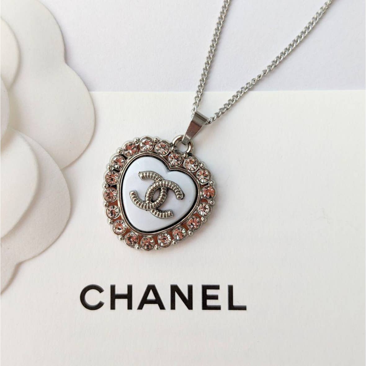 Chanel CC Heart necklace with silver and pearl