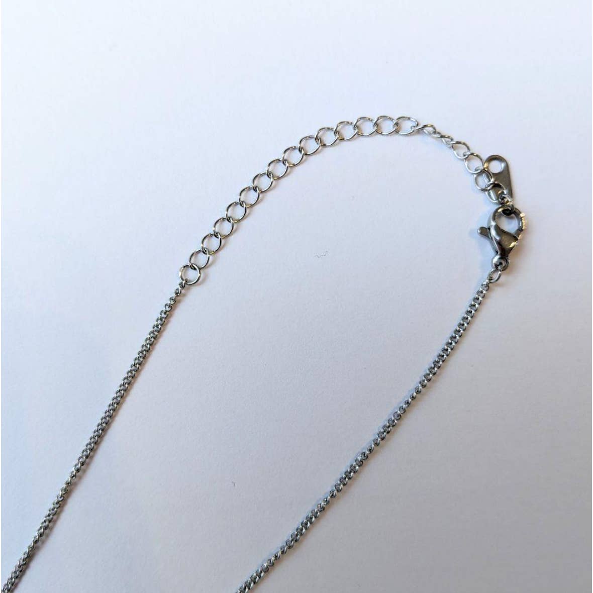 Chanel CC Heart necklace with silver and pearl